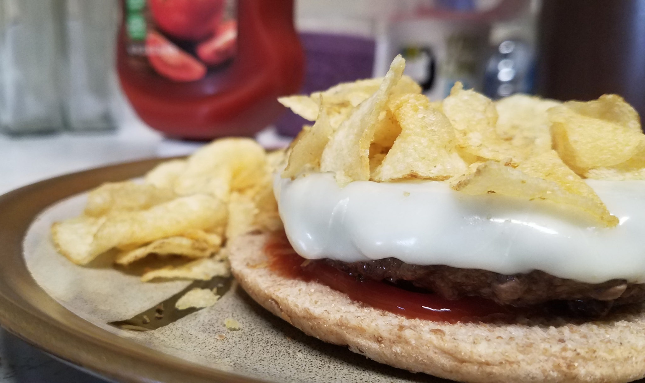 Cheeseburger and chips on bread thin Sandwich Portraits